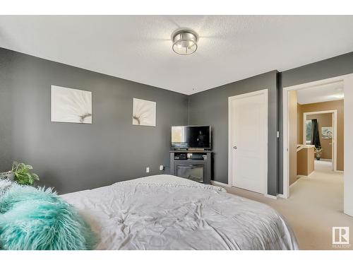 #120 5001 62 Street Nw, Beaumont, AB - Indoor Photo Showing Bedroom