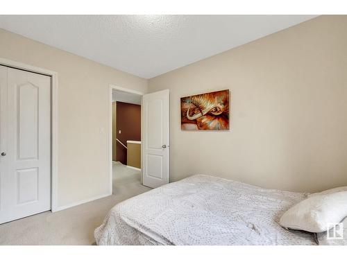 #120 5001 62 Street Nw, Beaumont, AB - Indoor Photo Showing Bedroom