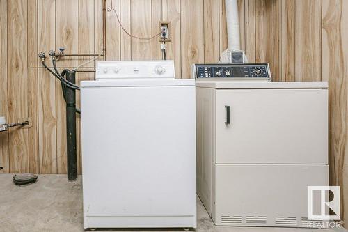 7715 144 Av Nw Nw, Edmonton, AB - Indoor Photo Showing Laundry Room