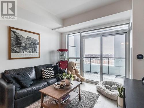 603 - 50 George Butchart Drive, Toronto, ON - Indoor Photo Showing Living Room