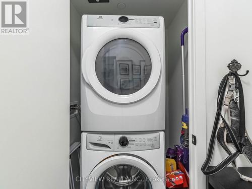 603 - 50 George Butchart Drive, Toronto, ON - Indoor Photo Showing Laundry Room