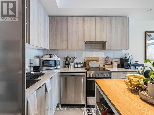 603 - 50 George Butchart Drive, Toronto, ON - Indoor Photo Showing Kitchen