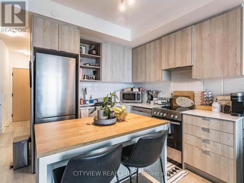 603 - 50 George Butchart Drive, Toronto, ON - Indoor Photo Showing Kitchen