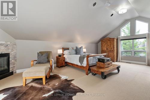 21 Trails End, Collingwood, ON - Indoor Photo Showing Bedroom With Fireplace