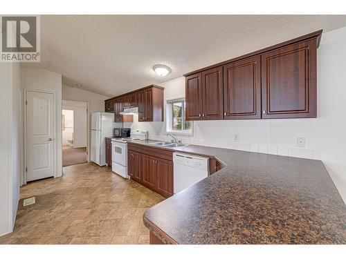 9773 Stephenson  Road Unit# 19, Fernie, BC - Indoor Photo Showing Kitchen With Double Sink