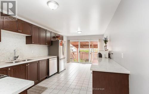 106 Wildberry Crescent, Brampton, ON - Indoor Photo Showing Kitchen With Double Sink