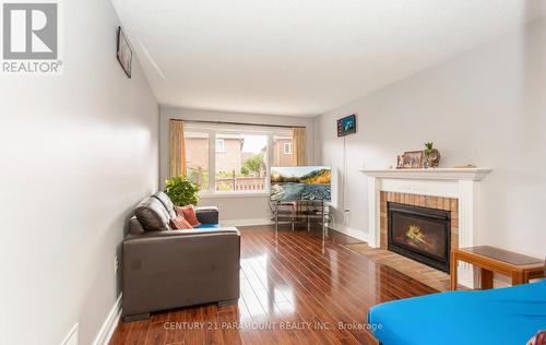 106 Wildberry Crescent, Brampton, ON - Indoor Photo Showing Living Room With Fireplace