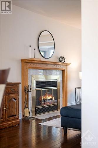 1045 Karsh Drive, Ottawa, ON - Indoor Photo Showing Living Room With Fireplace