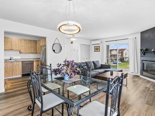 Dining room - 105-71 Av. Brown, Vaudreuil-Dorion, QC - Indoor With Fireplace