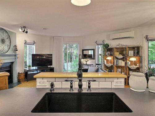 Kitchen - 104-787 Ch. Ozias-Leduc, Otterburn Park, QC - Indoor With Fireplace