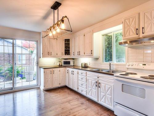 Kitchen - 13537 Rue Turcot, Mirabel, QC - Indoor Photo Showing Kitchen With Double Sink