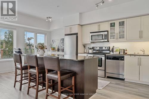 210 - 5 Richgrove Drive, Toronto, ON - Indoor Photo Showing Kitchen With Stainless Steel Kitchen With Upgraded Kitchen