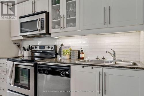 210 - 5 Richgrove Drive, Toronto, ON - Indoor Photo Showing Kitchen With Stainless Steel Kitchen With Double Sink With Upgraded Kitchen