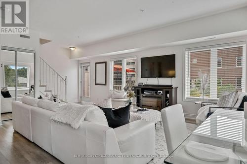 210 - 5 Richgrove Drive, Toronto, ON - Indoor Photo Showing Living Room