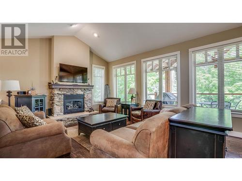 251 Predator Ridge Drive Unit# 36, Vernon, BC - Indoor Photo Showing Living Room With Fireplace