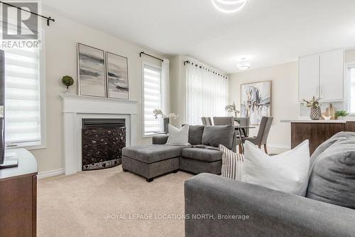 47 Allegra Drive, Wasaga Beach, ON - Indoor Photo Showing Living Room With Fireplace