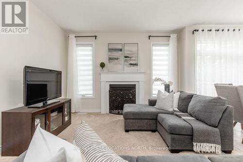 47 Allegra Drive, Wasaga Beach, ON - Indoor Photo Showing Living Room With Fireplace