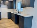 5395 W Venta Drive, Prince George, BC  - Indoor Photo Showing Kitchen With Double Sink 