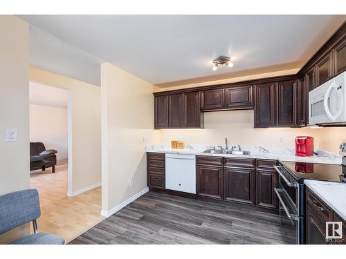 160 Roseland Vg Nw, Edmonton, AB - Indoor Photo Showing Kitchen With Double Sink