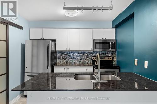 #309 - 98 Aspen Spring Drive, Clarington, ON - Indoor Photo Showing Kitchen With Double Sink