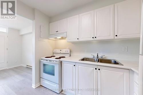 404 - 30 Gloucester Street, Toronto, ON - Indoor Photo Showing Kitchen With Double Sink