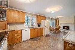 Bright open kitchen looking towards living room area - 