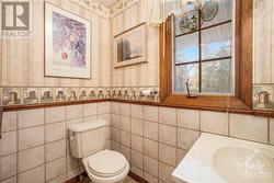 Powder room off kitchen - 