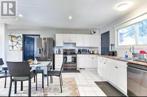 7813 Mulhern Street, Niagara Falls, ON - Indoor Photo Showing Kitchen With Double Sink