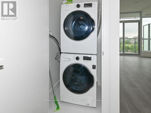 707 - 10 De Boers Drive, Toronto, ON - Indoor Photo Showing Laundry Room