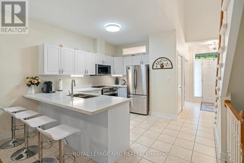 13 - 8142 Costabile Drive, Niagara Falls, ON - Indoor Photo Showing Kitchen With Double Sink