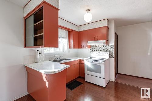 6123 144 Av Nw Nw, Edmonton, AB - Indoor Photo Showing Kitchen With Double Sink