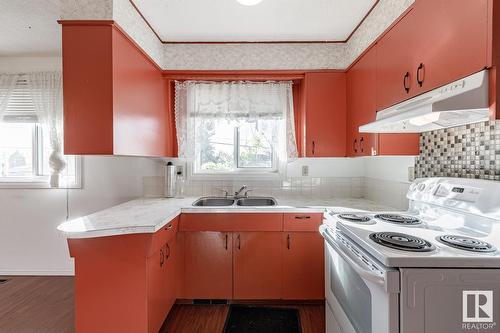 6123 144 Av Nw Nw, Edmonton, AB - Indoor Photo Showing Kitchen With Double Sink