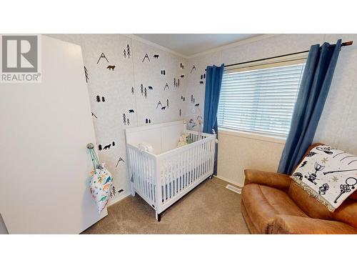 1024 Steepleview  Nw Drive, Cranbrook, BC - Indoor Photo Showing Bedroom