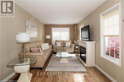 67 Bloomington Drive, Cambridge, ON - Indoor Photo Showing Living Room With Fireplace