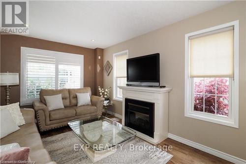 67 Bloomington Drive, Cambridge, ON - Indoor Photo Showing Living Room With Fireplace