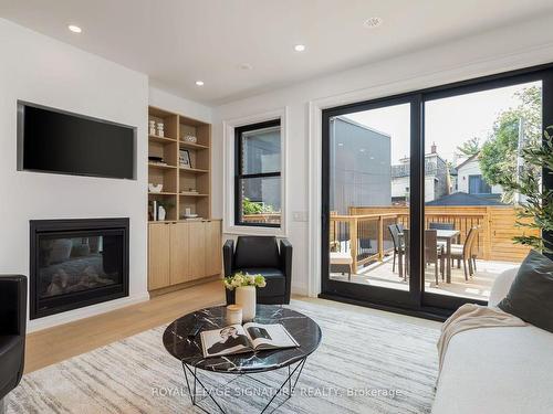 8 Dartnell Ave, Toronto, ON - Indoor Photo Showing Living Room With Fireplace