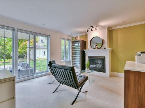 Salle familiale - 386 Ch. Du Lac-Millette, Saint-Sauveur, QC - Indoor Photo Showing Living Room With Fireplace