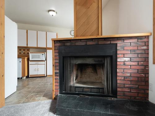 8 Beryl Drive, Logan Lake, BC - Indoor Photo Showing Living Room With Fireplace