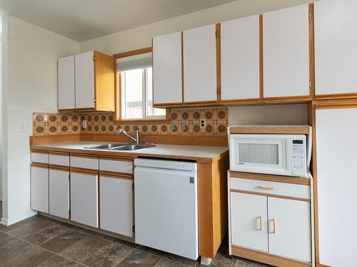 8 Beryl Drive, Logan Lake, BC - Indoor Photo Showing Kitchen With Double Sink