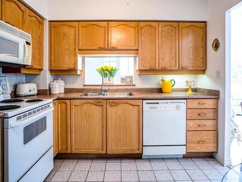 306-115 Bonis Ave, Toronto, ON - Indoor Photo Showing Kitchen With Double Sink