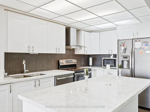 709-8 Silver Bell Grve, Toronto, ON - Indoor Photo Showing Kitchen With Double Sink With Upgraded Kitchen