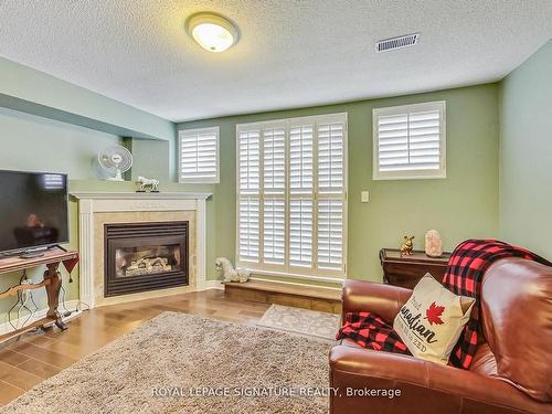 49 San Remo Terr, Toronto, ON - Indoor Photo Showing Living Room With Fireplace