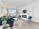 403-7162 West Saanich Rd, Central Saanich, BC  - Indoor Photo Showing Living Room With Fireplace 