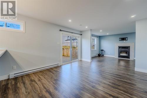 17 Quantum Drive, Paradise, NL - Indoor Photo Showing Other Room With Fireplace