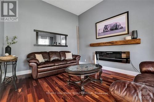 11 Alder Crescent, Ottawa, ON - Indoor Photo Showing Living Room With Fireplace