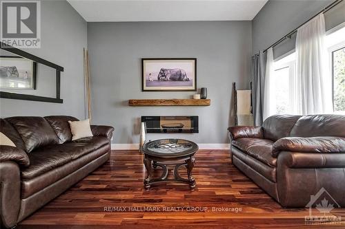 11 Alder Crescent, Ottawa, ON - Indoor Photo Showing Living Room With Fireplace