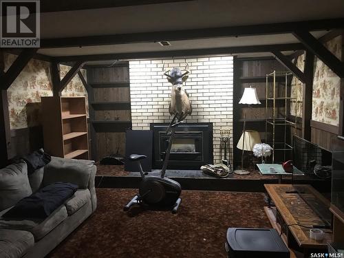 106 Short Place, Saskatoon, SK - Indoor Photo Showing Living Room With Fireplace