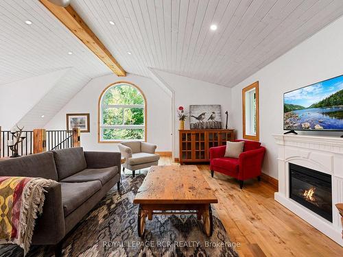 425457 25 Sdrd, Amaranth, ON - Indoor Photo Showing Living Room With Fireplace