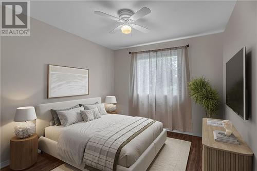 VIRTUALLY STAGED - 225 Wellington Street E, Cornwall, ON - Indoor Photo Showing Bedroom