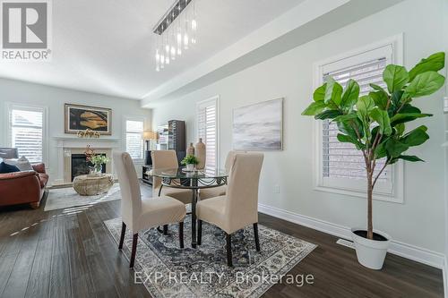 3356 Minerva Way, Burlington, ON - Indoor Photo Showing Dining Room With Fireplace